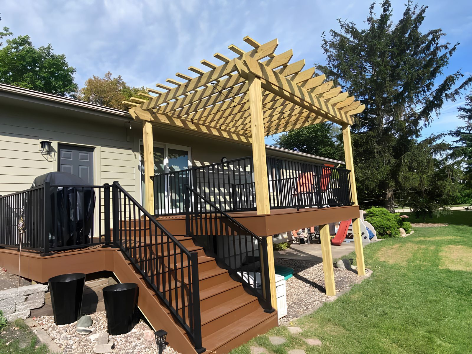 Deck with pergola setup in Ames backyard